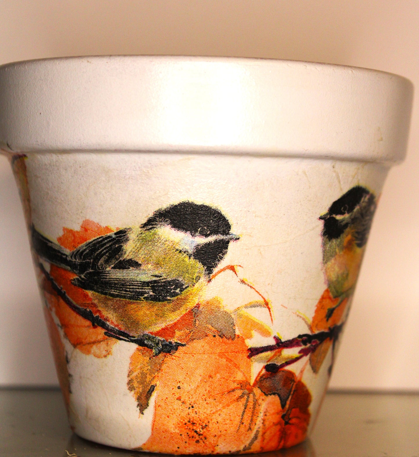 Decoupage terracotta plant pot